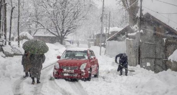 Flights suspended, highway closed as snowfall continues in Kashmir valley
