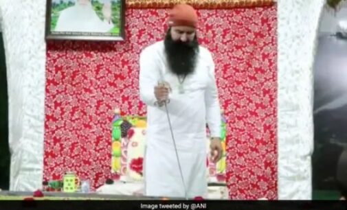 Out on parole, Dera chief Ram Rahim cuts giant cake with sword