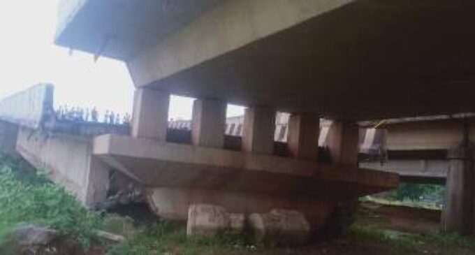 A portion of a bridge on NH 16 collapses