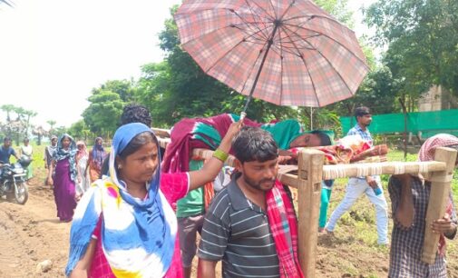 Patient Carried Half Kilometer in Wooden Cot Due to Poor Road