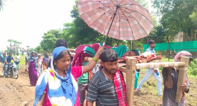 Patient Carried Half Kilometer in Wooden Cot Due to Poor Road