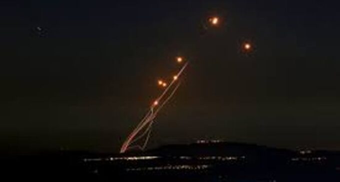 Iran fires nearly 200 missiles into Israel; Israel vows retaliation ‘at place and time we decide’