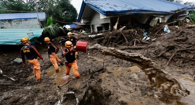 At least 115 dead and missing in massive flooding and landslides in Philippines