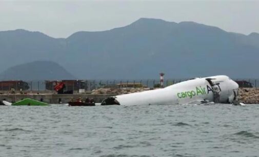 Cargo aircraft skids off Hong Kong runway into sea, killing two people