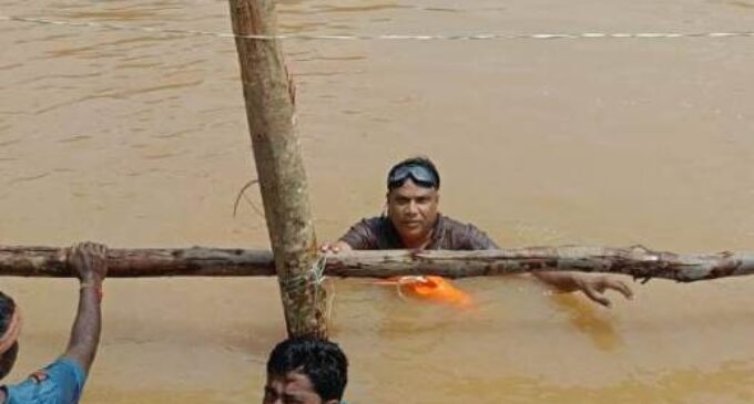 SE Dr Dalai  Wades Into Deep Waters to Lead Baitarani Embankment Repair